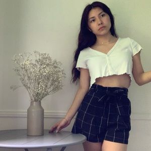 High waisted black dress shorts with pockets